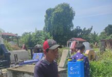 TPU Padang Bulan Tak Boleh Kumuh! Mandor Benget Simanjuntak Turun Langsung Semprot Seluruh Area Pemakaman